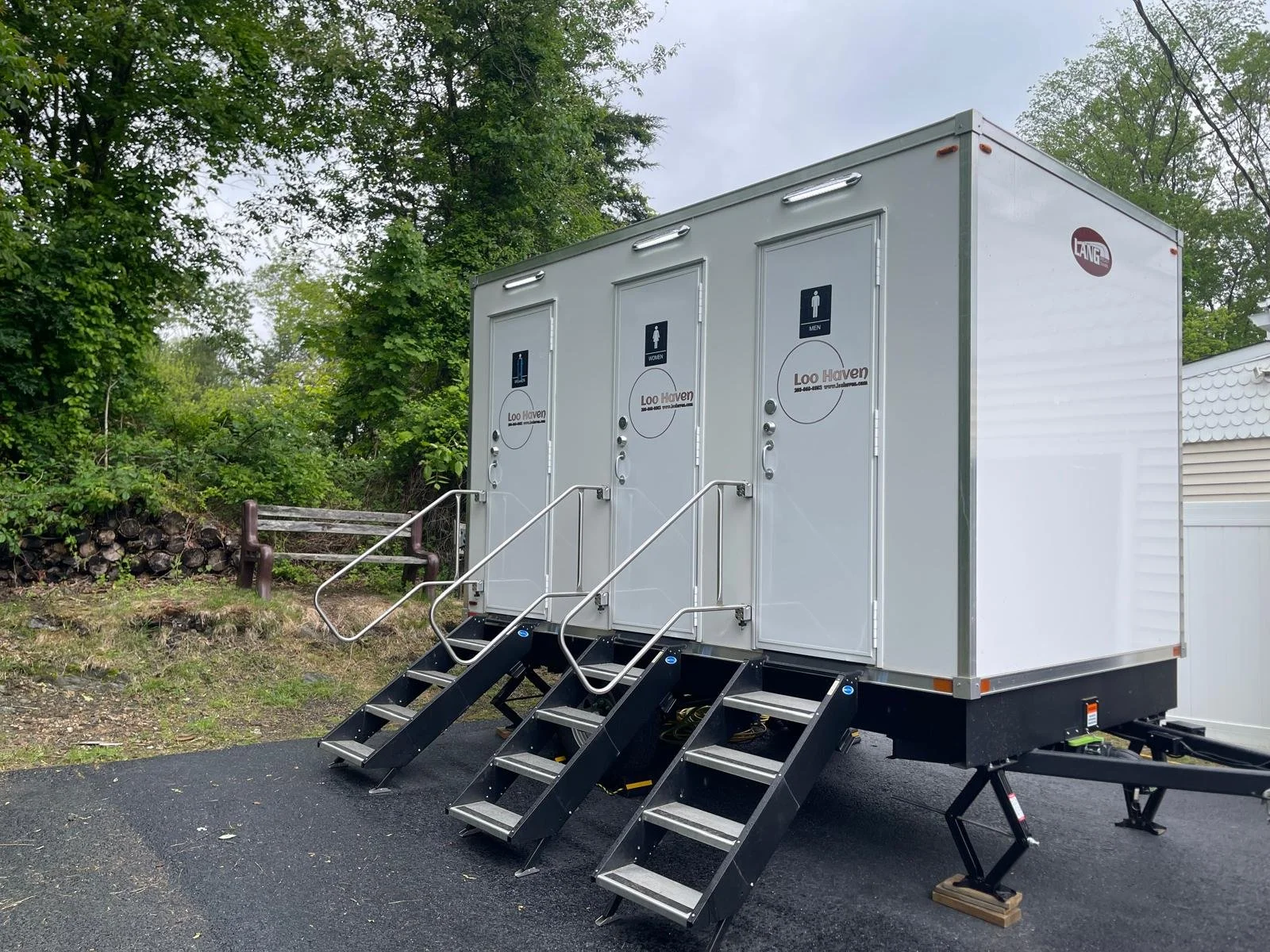 3-stall luxury restroom trailer set up for an event in Canton, Connecticut