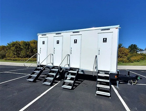4-stall luxury restroom trailer parked at an event in Berlin, Connecticut