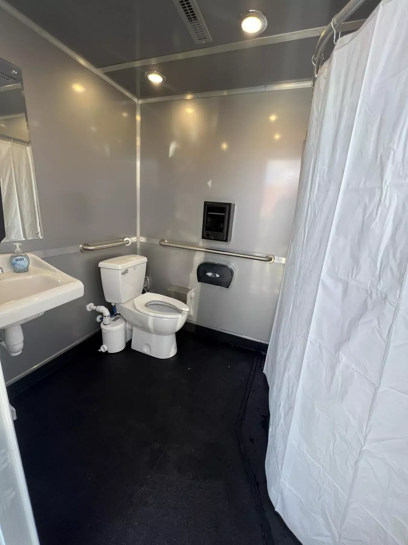 Wheelchair-accessible restroom and shower combo trailer
